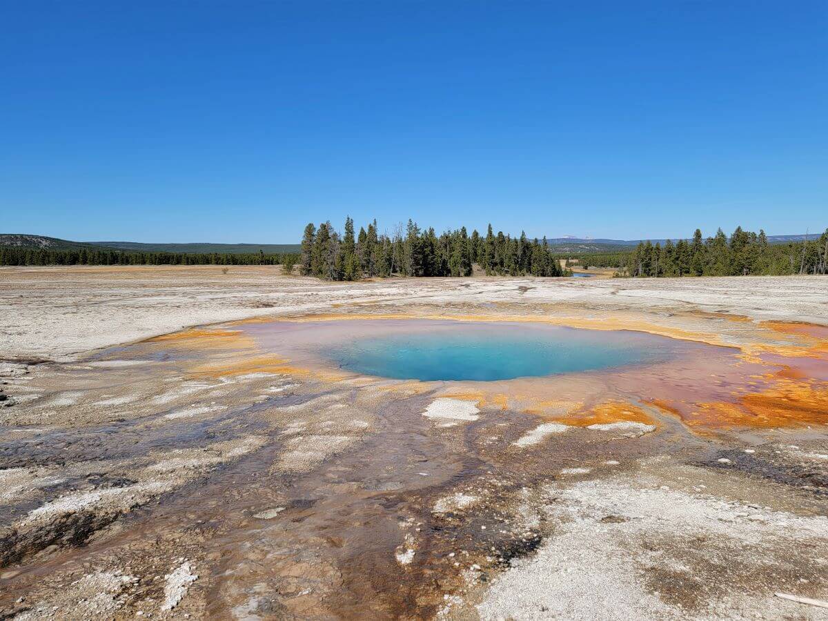 The blue thermal pools at Yellowstone National Park in Wyoming on this u.s. national parks list by state