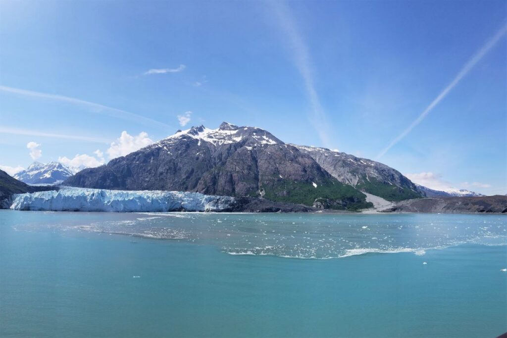 A glacier on the blue sea in Glacier Bay National Park in Alaska on this list of national parks by state