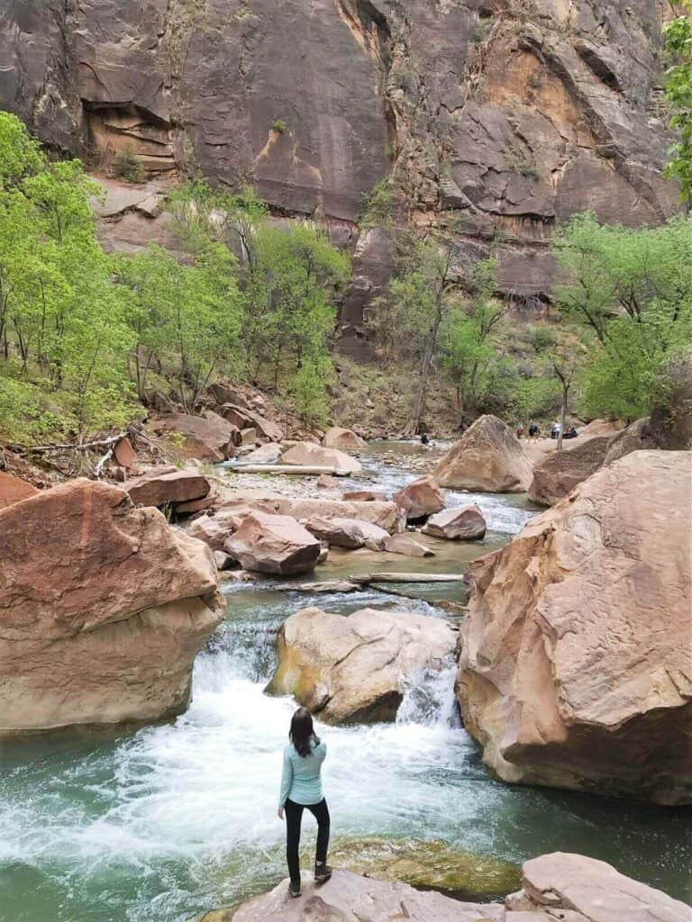 This Zion National Park 2 day itinerary includes a hike in The Narrows, this section of the river where the canyon walls soar overhead.