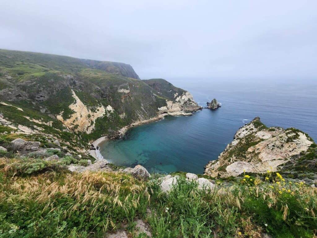 View above an ocean cove with cliffs around it at Channel Islands National Park.