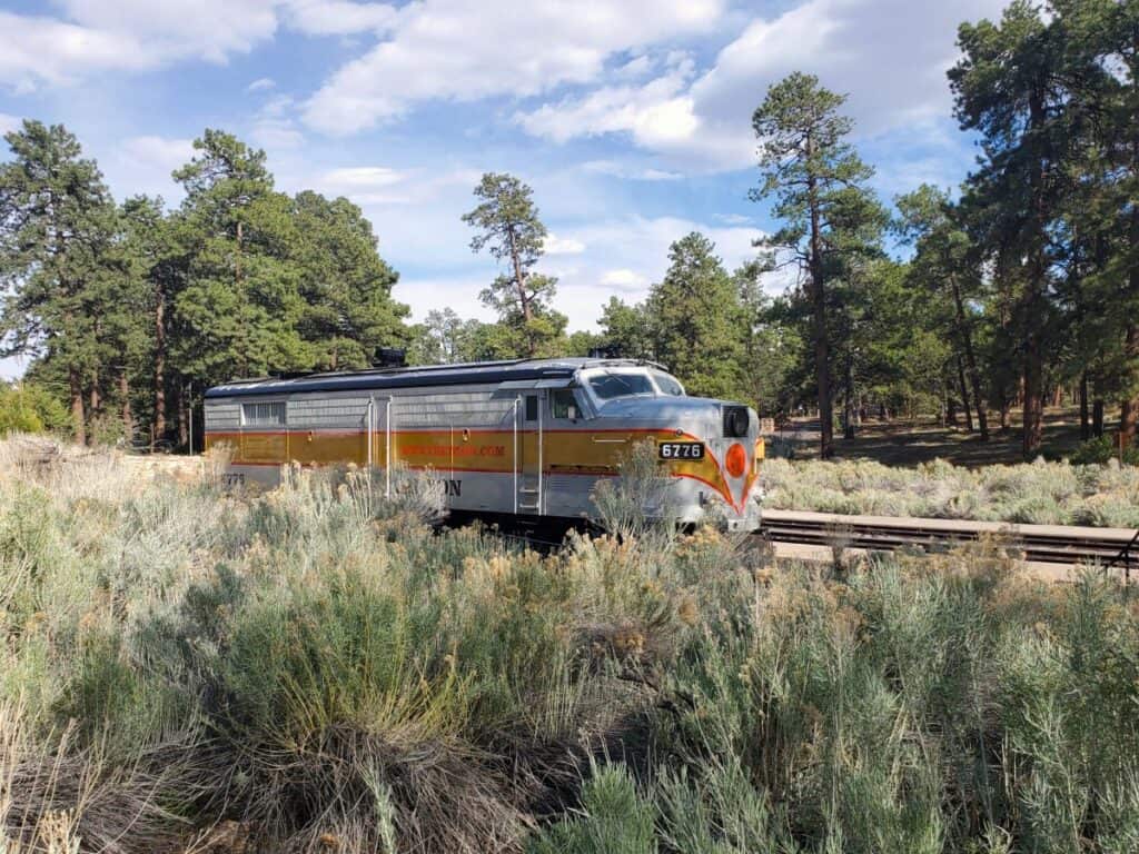 White and yellow train car on the Grand Canyon railroad