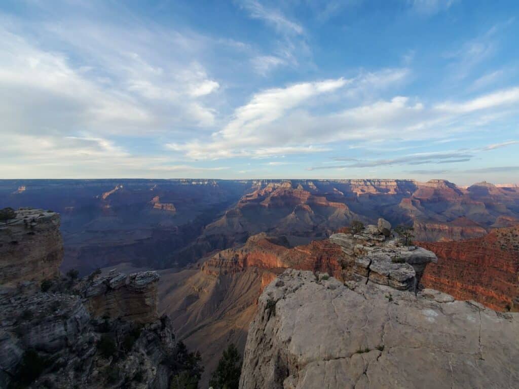 Overlook at the Grand Canyon with a rock jutting into the canyon